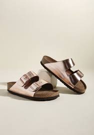Birkenstock Arizona Rose Gold Sandals Set Up Your Tent Kick Off Those Hiking Boots And Step Into These Birkenstock Arizona Sandals This Met Camper Sandals Birkenstock Birkenstock Sandals Arizona