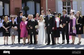 Countess Sandra Bernadotte, center left, and Count Bjoern Bernadotte,  center right, stand surrounded by their families after having married on  the island Mainau in Lake Constance, southern Germany, Thursday, May 7,  2009. (