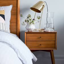 These white round nightstand features exciting and sophisticated patterns. Mid Century Nightstand
