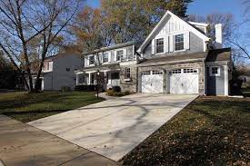 Heide replicated the columns on the front of the colonial revival onto the new back porch in a smaller size. Rock Hardy Plank Home Addition Plans Garage Addition Home Addition