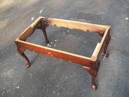 We painted the legs gold, then wrapped a piece of velvet like fabric over a precut piece of foam using nothing more than a staple gun. Diy Coffee Table Bench My Repurposed Life Rescue Re Imagine Repeat
