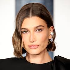 Hailey Bieber's Itty-Bitty Bun Proves You Don't Need a Ton of Hair for an  Updo — See the Photos