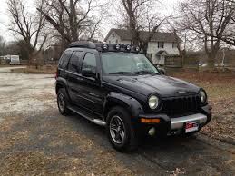 Image result for Brilliant Black 2003 Jeep