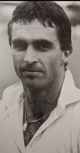 Who is the cricket player in the photo?