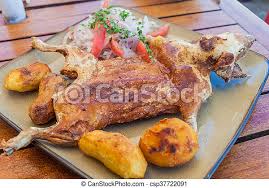 Roasted guinea pig aka cuy (a local traditional delicacy). Roasted Guinea Pig Traditional Meal In Peru Canstock