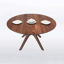 We also like that this table comes with adjustable levelers to ensure stability on uneven floors. Round Expandable Dining Table In Solid Walnut Etsy