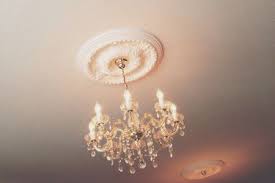 Medallions Cover Holes Around A Ceiling Box