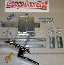 After removing the old door, installing the new door is done by stacking the door panels one at a time and fitting use locking pliers to lock the door in place. Garage Door Lock Kit