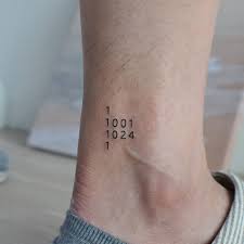 A system of temporary tattoos for triathletes. Numbers Tattoo On The Ankle