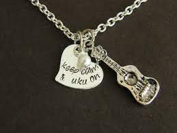 Keep Calm Uku On Aluminum Necklace With Ukulele Charm And Etsy Music Jewelry Ukulele Gifts Tiny Jewelry
