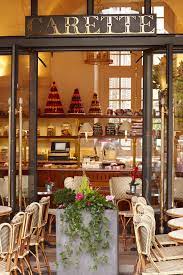 salon de the carette paris delightful display of sweets in a charming parisian cafe je taime paris restaurants parisian cafe paris cafe
