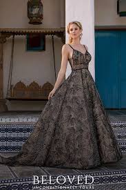 Beautifully crafted from rustic vine and leaf lace in a dramatic black shade, this gown features detachable long lace sleeves and a voluminous skirt that maintains elegant appeal. 9 Bold Black Wedding Dresses For Your Non Traditional Wedding Day Blog Casablanca Bridal