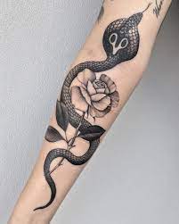 Black And Grey Snake And Rose Tattoo By Justinoliviertattoo Around Arm Tattoo Cobra Tattoo Snake Tattoo Design