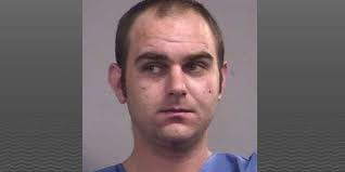 Man who fled car crash charged in kidnapping case