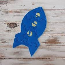 These puzzles come in a wooden box with separate compartments for each puzzle. Rocket Kids Puzzle Felt Easy Puzzles Travel Toy Toddler Learning Educational Toy Puzzles For Kids Rockets For Kids Puzzle Games For Kids