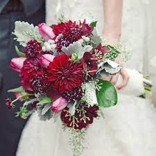 If you are getting married in autumn season, you might consider these autumn wedding flowers for your bouquets and wedding flowers. Dark Red Bridal Bouquet Red Bridal Bouquet Bridal Bouquet Wedding Flower Inspiration