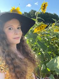 Is there a photographer available for a TFP shoot at Dix sunflower field?