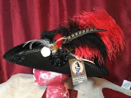 Featuring a antiqued pin, exotic feather cluster. Pirate Hat With Big Red Feather Etsy Pirate Hats Red Feather Feather