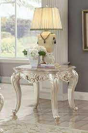 We offer both large and small coffee tables in a range of materials, like wood, metal, and glass, and in multiple shapes—rectangular, square, round, and oval—to fit your space and your style. Acme 82442 Astoria Grand Jacqueline Gorsedd Antique White Finish Wood Marble Top Chair Side End Table End Tables Wood And Marble Living Room Decor Inspiration