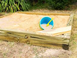 Fill with sand and dig away…. A Sand Box That Converts To A Raised Bed Hgtv