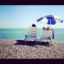 Relaxing On Sochi S Pebble Beaches Outdoor Pebble Beach Outdoor Blanket