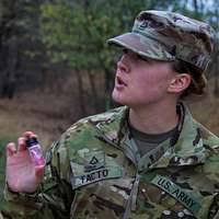 During Marine Week of the Career Orientation and Training of Midshipmen  (CORTRAMID) West 2001 at Marine Corps Base (MCB) Camp Pendleton,  California, midshipman Melanie Ahle looks at the next obstacle course  challenge -