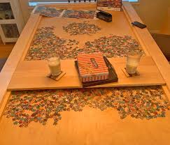This Amazing Dining Table Has A Hidden Game Puzzle Compartment Under The Surface In 2020 Dining Table Custom Dining Tables Puzzle Table