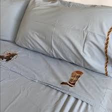 Snooze in luxury with this 400 thread count cotton sheet set, offering lightweight softness with a smooth and glossy sateen. Home Living Flat Sheets King Flat Sheet 1970s Bedding 1970 S Vintage Yellow Gold Floral Percale Cal King Flat Sheet Yellow Floral Cal King Sheet