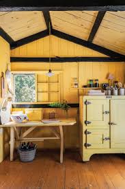 Bronze hardware marries the two colors with simple round shapes. Trend Alert Bright Yellow Kitchens With Painted Kitchen Cabinets