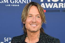 Lower down is a phoenix that takes up the majority of his forearm. Hardly Anyone Noticed Keith Urban S New Tattoo At The Acm Awards