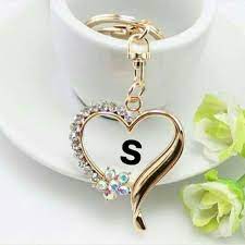Find the perfect s alphabet stock photo. S For Smile Stylish Letters Pendant Heart Locket
