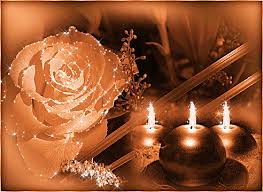 Simple centerpieces a simple centerpiece can be made from a large candle holder and basic flowers, greenery, vines, beads, or ribbon. Flowerroseorangecandlessparkle Butterfly Candles Candles Candle Gif