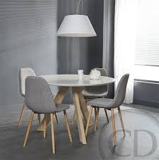 Les designers redoublent d'inventivité pour créer des modèles de tables à la fois belles et fonctionnelles au quotidien. Table De Cuisine Ronde Blanche Scandinave Sur Cdc Design