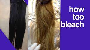 Lightening hair extensions requires multiple applications; How To Bleach Hair Extensions Make Hair Extensions Lighter Dye Hair Extensions From Dark To Blond Youtube