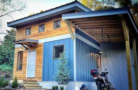 650 Sq Ft Urban Micro Home Is A Small House For Outdoorsy Couple Micro House Modern House Design House Plans