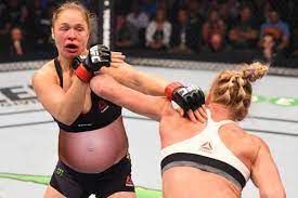 She is the first ufc women's bantamweight champion , as well as the last strikeforce women's bantamweight champion. Ronda Rousey To Become First Woman To Enter The Octagon While 8 Months Pregnant Honi Soit