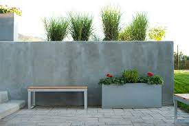 The price for standard units is about $3 each. Cinder Block Retaining Wall Finishing Moderner Hinterhof Moderne Landschaftsgestaltung Betonzaun