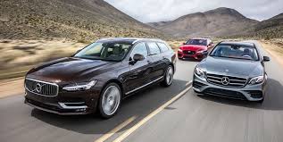 The classy volvo v90 offers a separate cross country variant with that rugged look, but it's available without it. Jaguar Xf Sportbrake S Awd Vs Mercedes Benz E400 4matic Volvo V90 T6 Awd