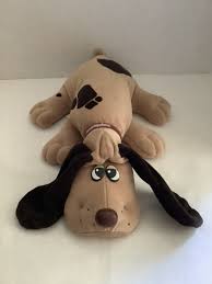 Cooler, leader with a trademark laugh. 1985 Original Pound Puppy Pound Puppies Puppies Pluto The Dog