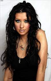 By 2001, aguilera traded in her cropped tees for leather chaps and added red and black highlights to her platinum blonde hair. Pin By Alex Kibsey On Sexiness Christina Maria Aguilera Christina Aguilera Black Hair Beautiful Christina