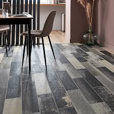 Flooring that combines beauty with the durability of tile. Worn Wood Grey Matt Wood Effect Porcelain Wall Floor Tile Pack Of 11 L 600mm W 150mm Diy At B Q