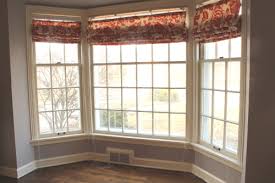 Add additional depth and texture to a room by layering bamboo roman shades under fabric, curtain panels or cornice boards, to make a window look larger, outside mount the shades on the window molding or up to the ceiling Outside In How To Mount Roller Shades To Achieve Different Looks Chic Blog Home Page