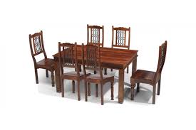 A transitional dining collection featuring solid wood grains and clean lines for a bold presence in your dining space. Jali Sheesham 180 Cm Chunky Dining Table And 6 Chairs Quercus Living