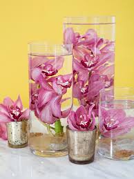 How to submerge flowers in water.you will need.vaseflowers, real or faux.scissors stones, peebles, glass stones.flower frog or large washer with fishing li. You Have To Learn Our Easy Trick For Submerging Flowers In Water