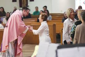Father Dufour installed as pastor of St. Theresa, St. Christopher parishes 