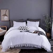 Complete with ties at the sides for an adjustable finish, this comforter can easily be tossed into the machine for a quick wash! Cozytide White Ruffle Tassel Comforter Set Queen Size 100 Washed Cotton Boho Bedding Comforter Ultra Fluffy Comfortable Lightweight 3 Pieces 1 White Boho Comforter 2 Ruffle Pillowcases