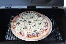 Team Traeger Wood Fired Pizza With The Traeger Pizza Stone Traeger Grill Recipes Smoked Food Recipes Traeger Recipes