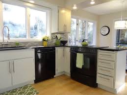 Black Appliances With Light Grey Cabinets One Project At A Time Diy Blog Black Appliances Kitchen Kitchen Cabinets With Black Appliances Black Kitchens