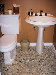 Pebble tile has all the features of water resistance, scratch resistance and stain resistance tile which a bathroom floor always needs. Mixed Pebble Tile Bathroom Floor Picture