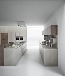 The protagonists are definitely the wood with its materiality and the brand new metal finishing that, aesthetically, is very close to the metal. Line K Kitchen With Island By Zampieri Cucine Design Stefano Cavazzana Interior Design Kitchen Small Custom Kitchens Modern Kitchen Storage